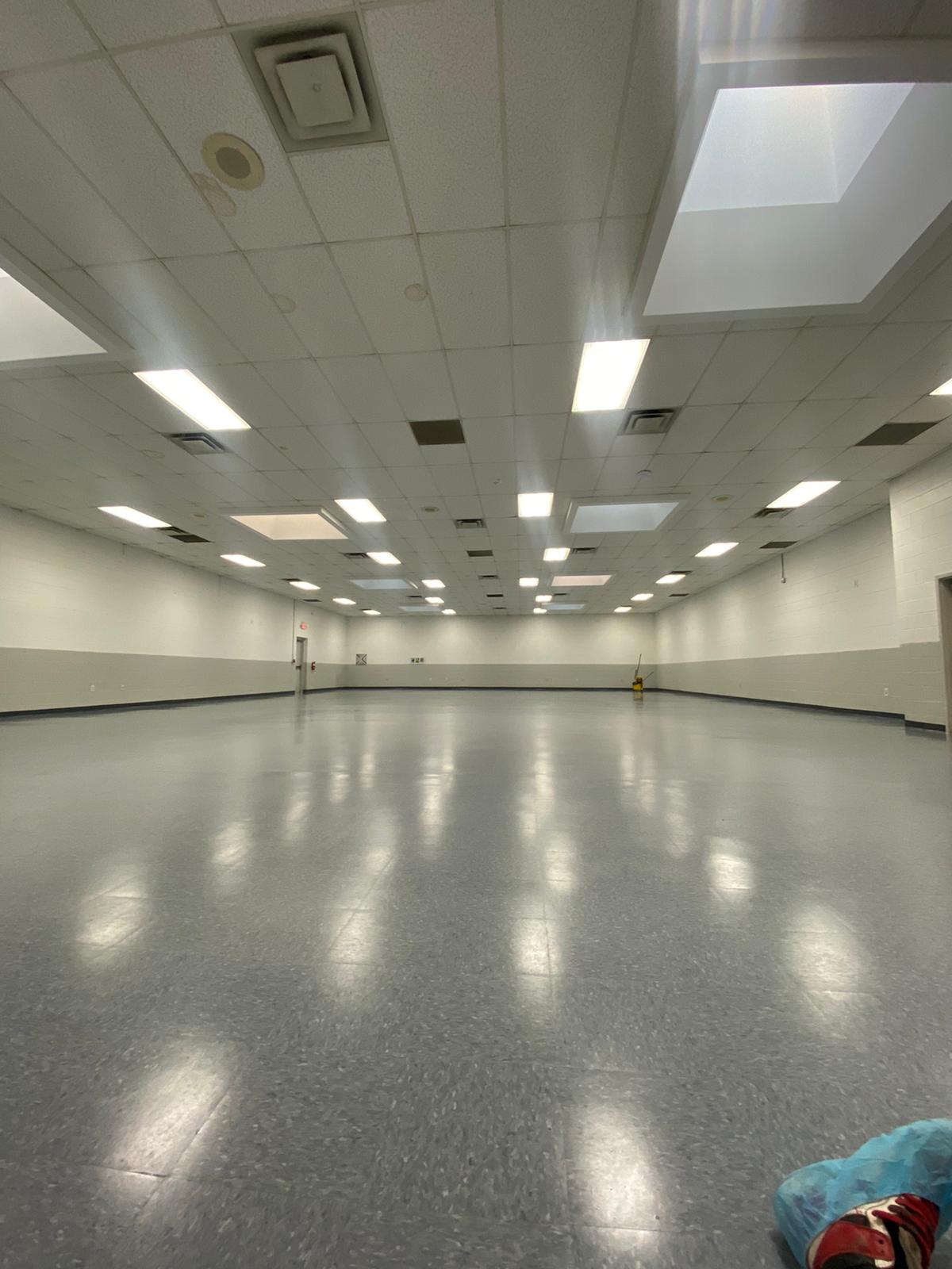 Completed commercial floor tile in a large open room